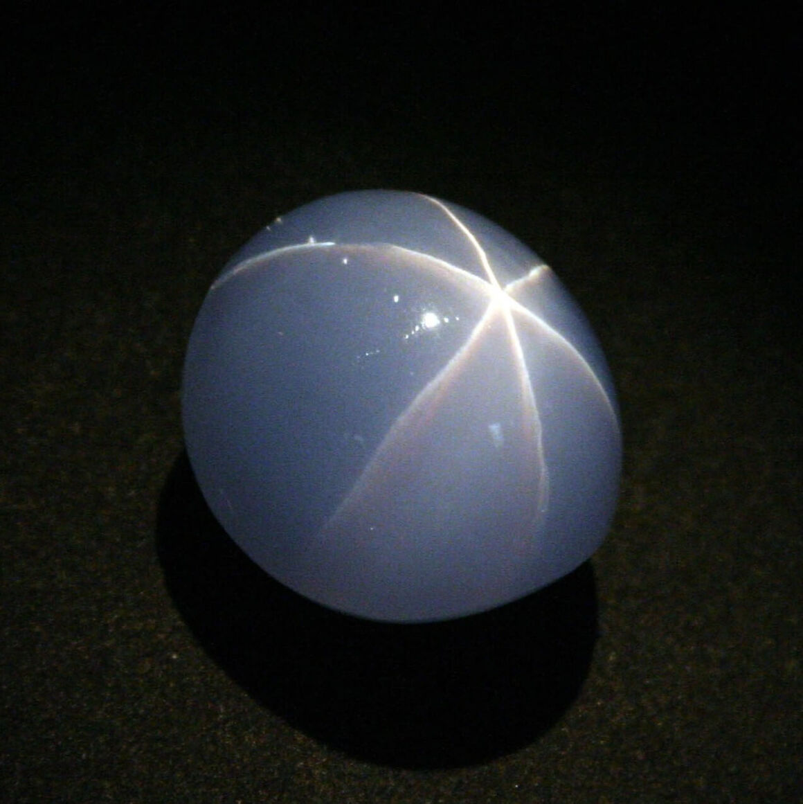 Star of India sapphire, a rare example of precious gemstones, displaying a prominent star-shaped asterism.