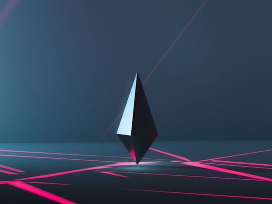 A futuristic, geometric gemstone-shaped object levitates above a smooth surface, illuminated by intersecting neon pink laser lines, visually representing the intersection of gemology, AI and big data.